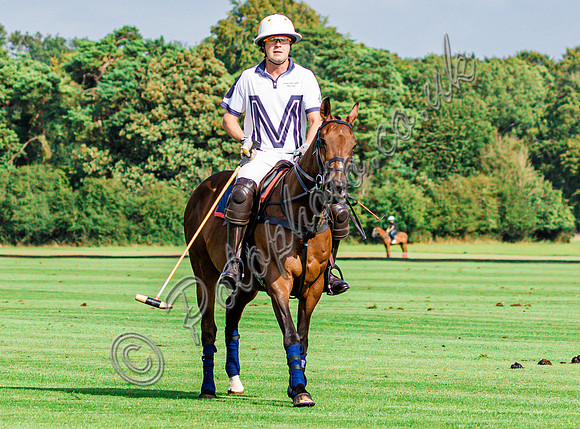 Polo action and presentation of the Syreford Plate NPM subsidiary at Cirencester Park