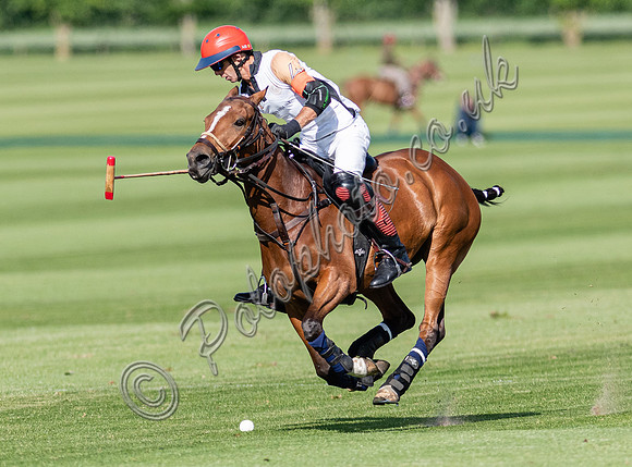 Polo action at the Robert Fraser Cup Final