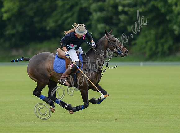 Tabba Woodd fast polo action from left to right alone on polo pony