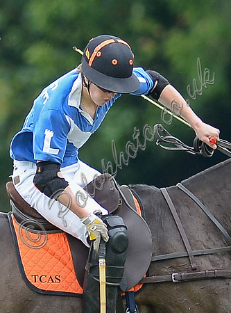 Close up study of Ollie Severn on horseback