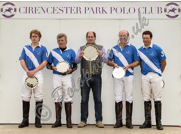 winning team Lodge Service on rostrum with Stirling McGregor in the middlethe trophy