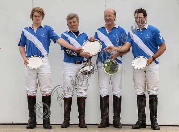 winning team Lodge Service on rostrum with the trophy