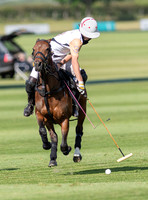 Polo action at the Robert Fraser Cup Final