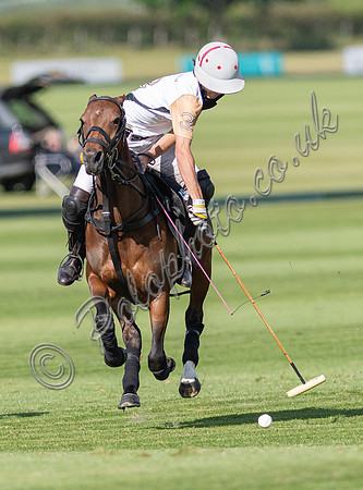 Polo action at the Robert Fraser Cup Final