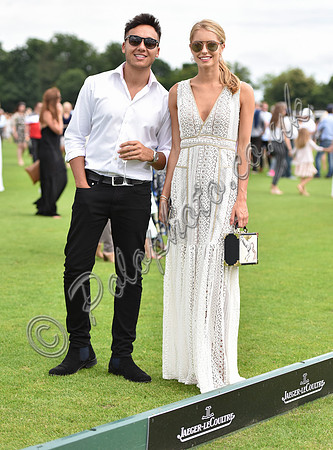 Model Amy Neville in full length neutral dress,