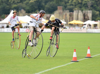Penny Farthing Polo with the Cowdray Ruins behind