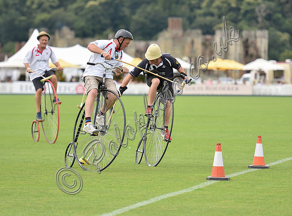 Penny Farthing Polo with the Cowdray Ruins behind