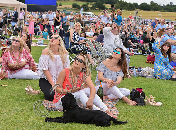 Spectators looking  upward