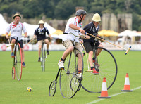 Penny Farthing Polo with the Cowdray Ruins behind