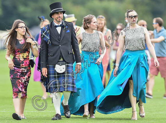 Groom and bridesmaids Treading the divots