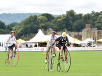 Penny Farthing Polo with the Cowdray Ruins behind