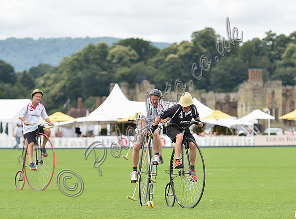 Penny Farthing Polo with the Cowdray Ruins behind