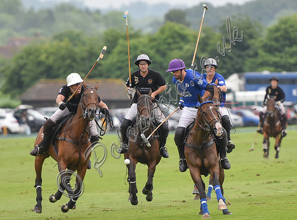Gold Cup Polo action between King Power Foxes and La Bamba de Areco