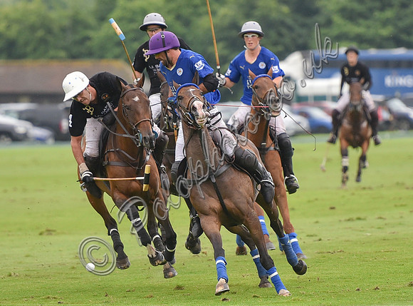 Gold Cup Polo action between King Power Foxes and La Bamba de Areco
