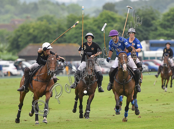 Gold Cup Polo action between King Power Foxes and La Bamba de Areco