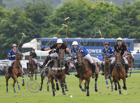 Gold Cup Polo action between King Power Foxes and La Bamba de Areco