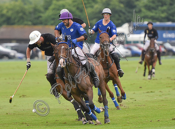 Gold Cup Polo action between King Power Foxes and La Bamba de Areco