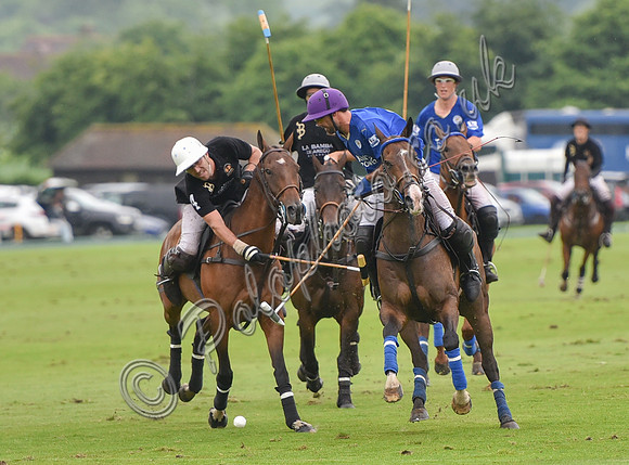 Gold Cup Polo action between King Power Foxes and La Bamba de Areco