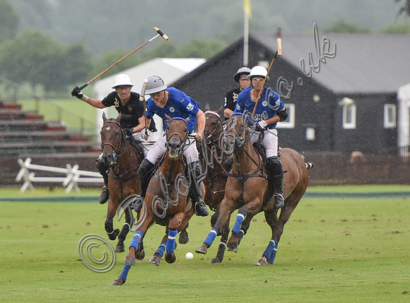 Gold Cup Polo action between King Power Foxes and La Bamba de Areco