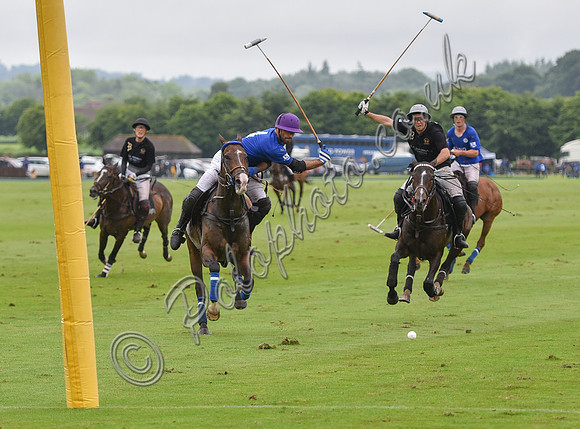 Gold Cup Polo action between King Power Foxes and La Bamba de Areco