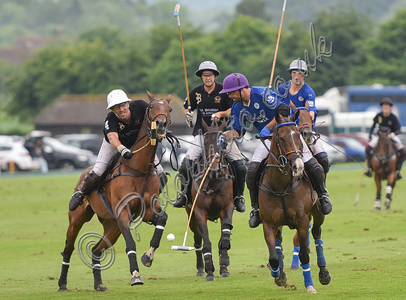 Gold Cup Polo action between King Power Foxes and La Bamba de Areco