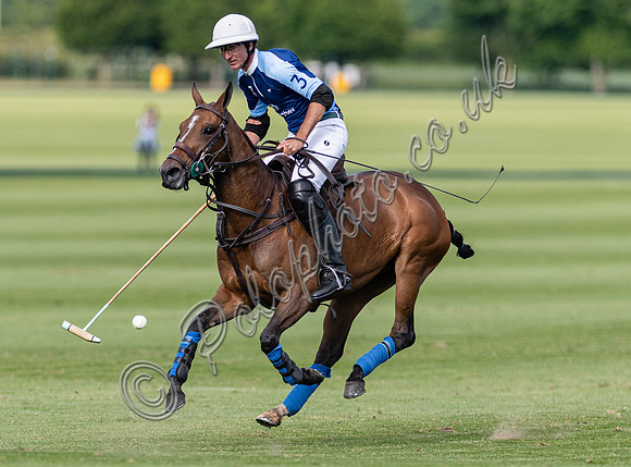 Polo action at the Robert Fraser Cup Final