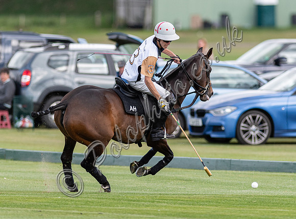 Polo action at the Robert Fraser Cup Final