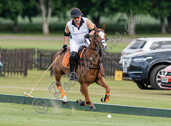 Polo action at the Robert Fraser Cup Final