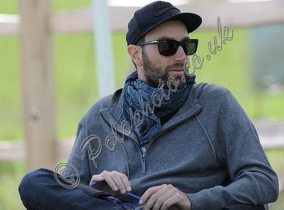 Polito Pieres sitting in casual clothes