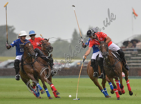 Gold cup polo action between Clarke and Green and King Power Foxes