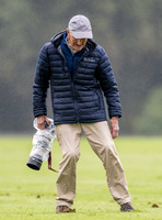 treading the divots on a rainy day at polo