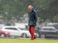 treading the divots on a rainy day at polo
