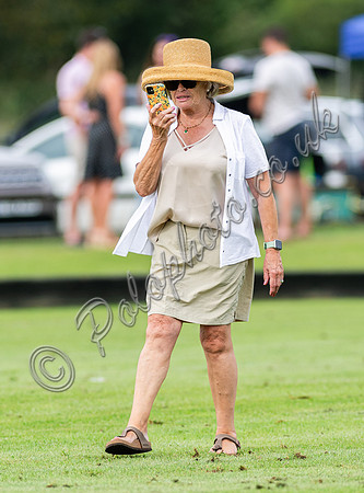 Treading the divots at half time, Kingscote Cup, Cirencester Park, 2023