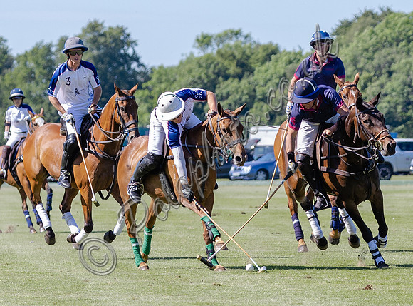 Polo action, Junior Cavalry Cup, Cirencester Park