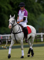 Prince William playing polo