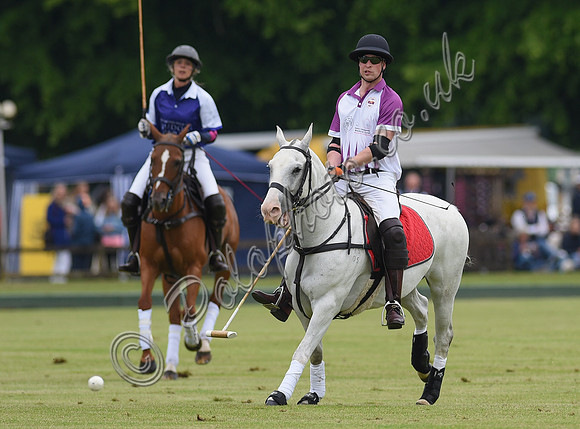 Prince William playing polo