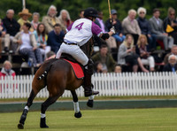 Prince William playing polo