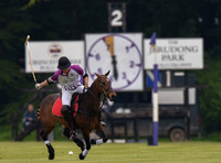 Prince William playing polo