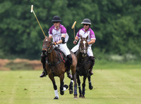 Prince William playing polo