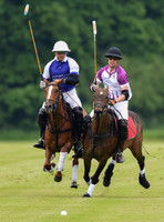 Prince William playing polo