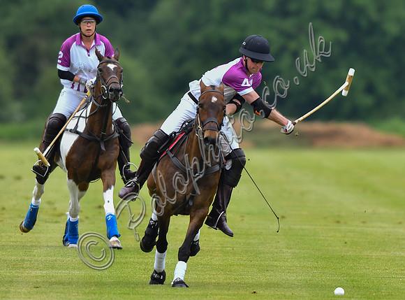 Prince William playing polo