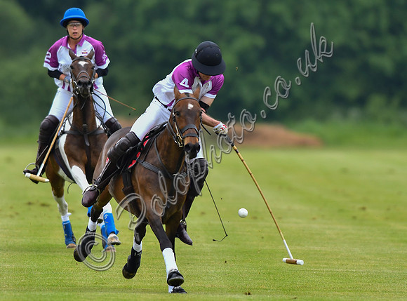 Prince William playing polo