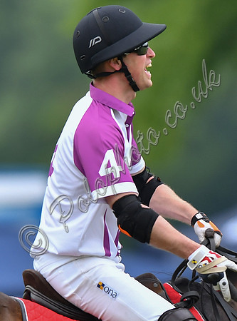 Prince William playing polo