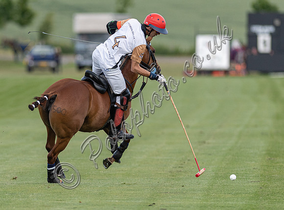 Polo action at the Robert Fraser Cup Final