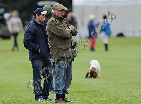 Mr Boyd and son watch the game from sidelines