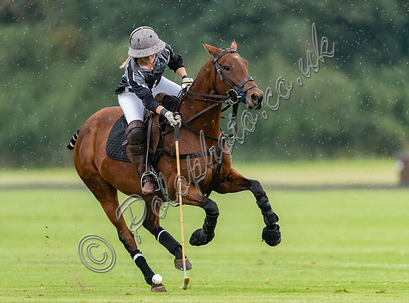 Polo action in the Sue Cudmore Associates Trophy, Cirencester Park