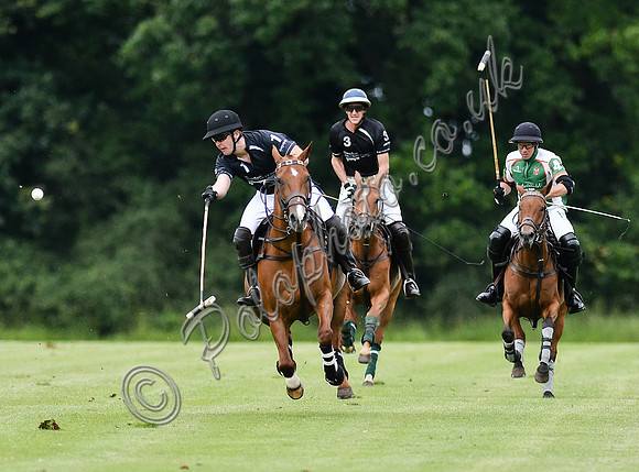 polo action for the Corinium Bowl, Cirencester Park