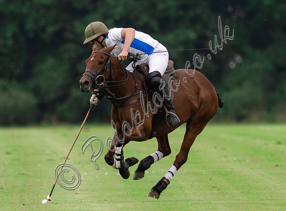Polo action the Town Cup End of Season Tournament, Cirencester Park