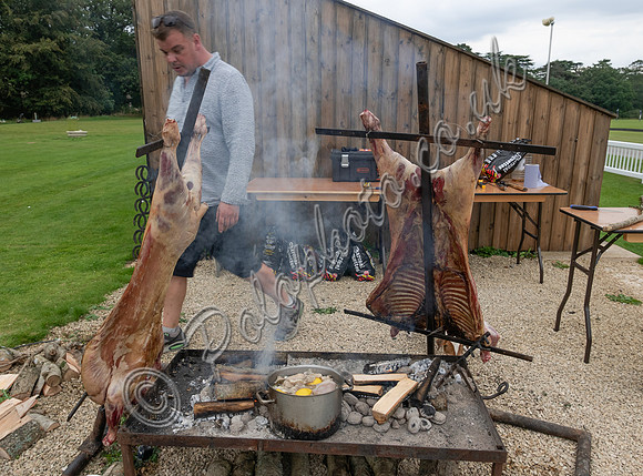 Lamb cooking on asado