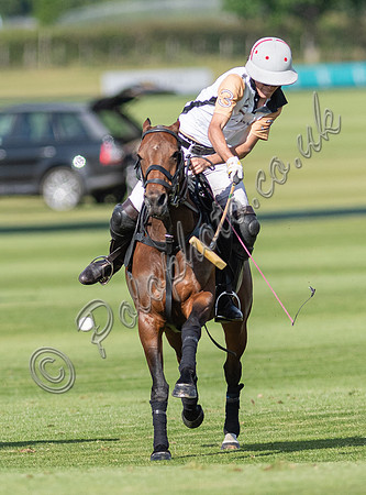 Polo action at the Robert Fraser Cup Final